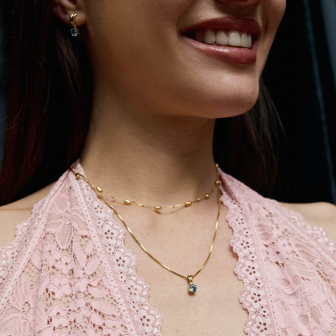 Joyas de oro con topacio azul